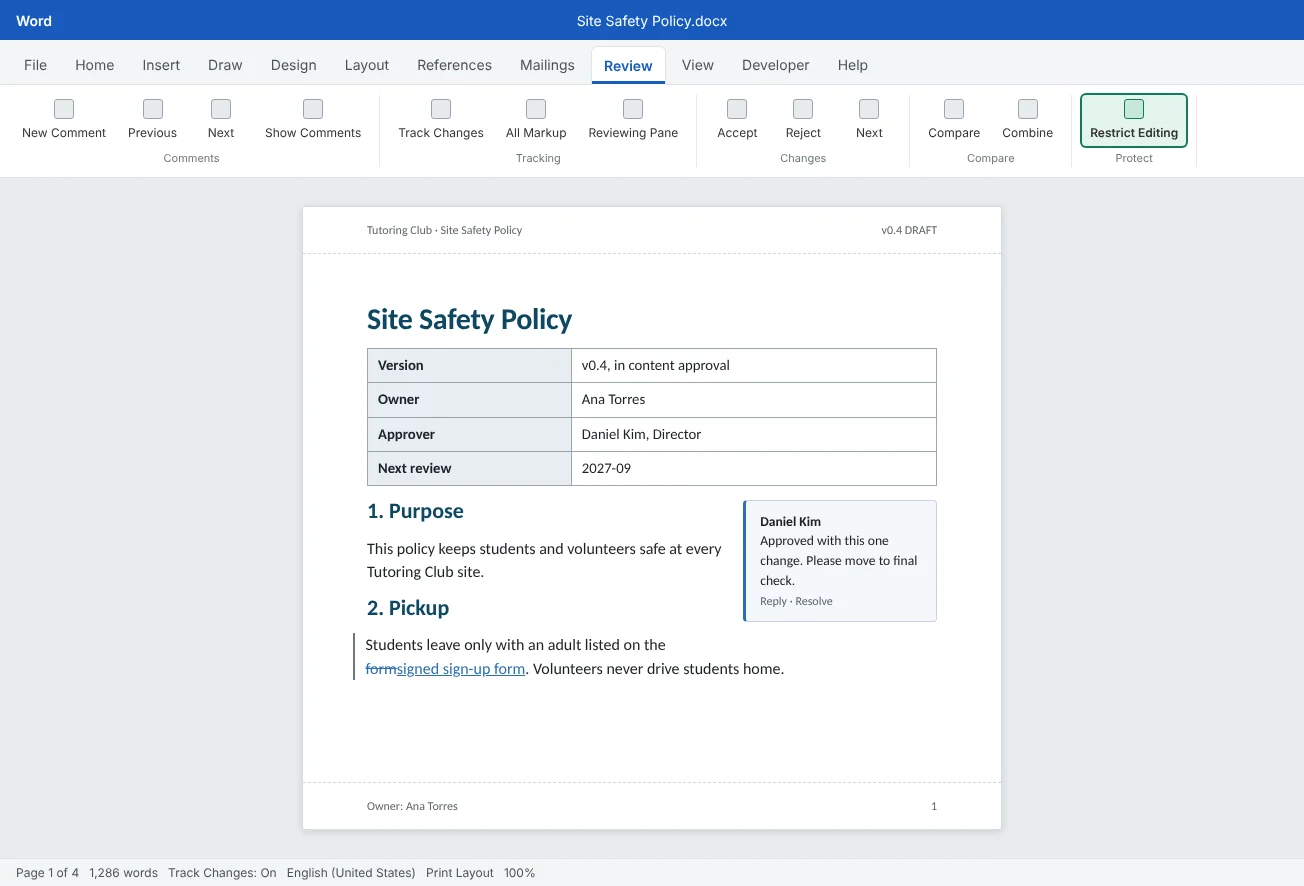 The Site Safety Policy at version 0.4, in content approval: a document control table at the top, a tracked change in the text and an approver's comment in the margin.